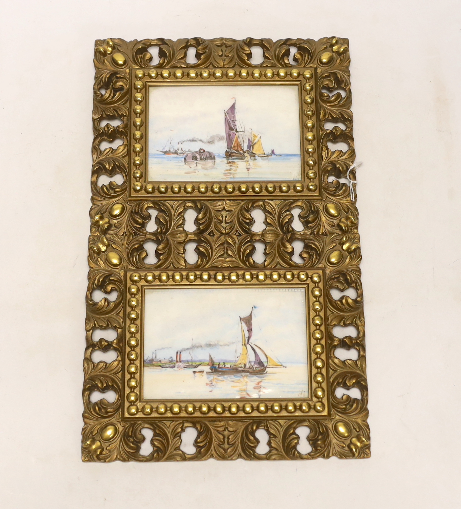 A pair of gilt framed painted porcelain plaques, indistinctly signed, 10x14cm excluding frame